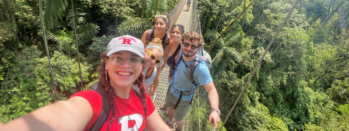 Group selfie on a rope bridge